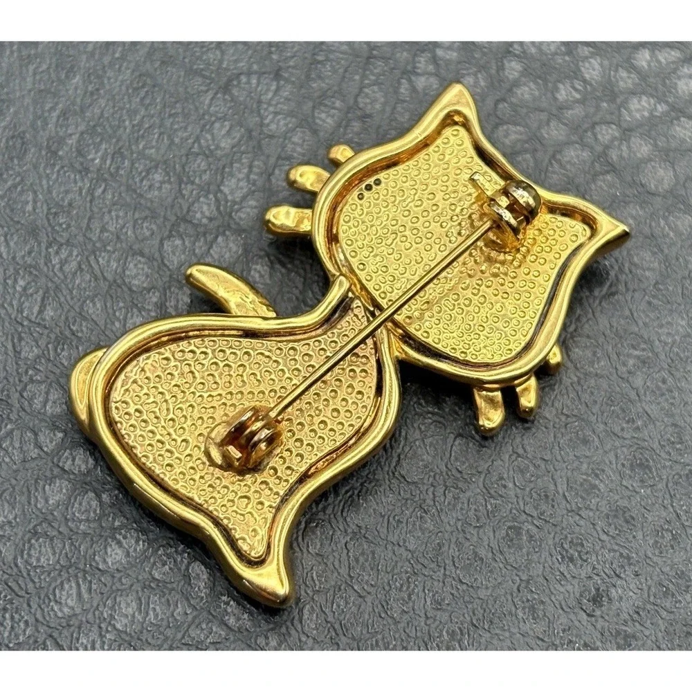 Vintage Modernist Cat Brooch Green Rhinestone Eyes Black Enamel Gold Tone Pin
